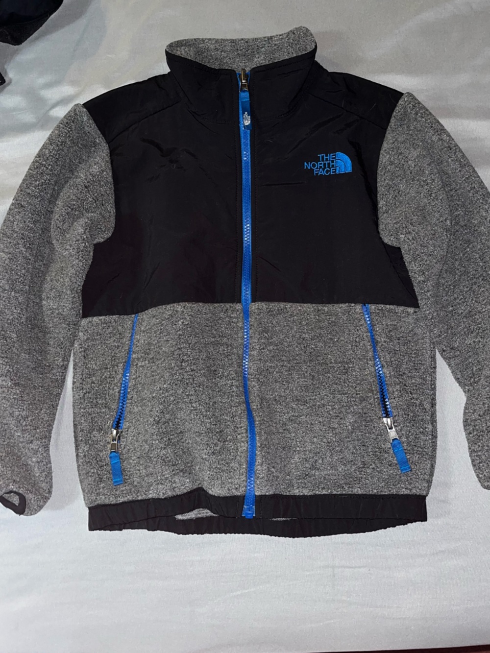 The North Face Grey & Black Jacket with Blue Zipper